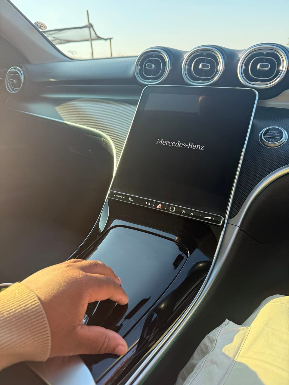 Centre console with the infotainment screen and engine start button